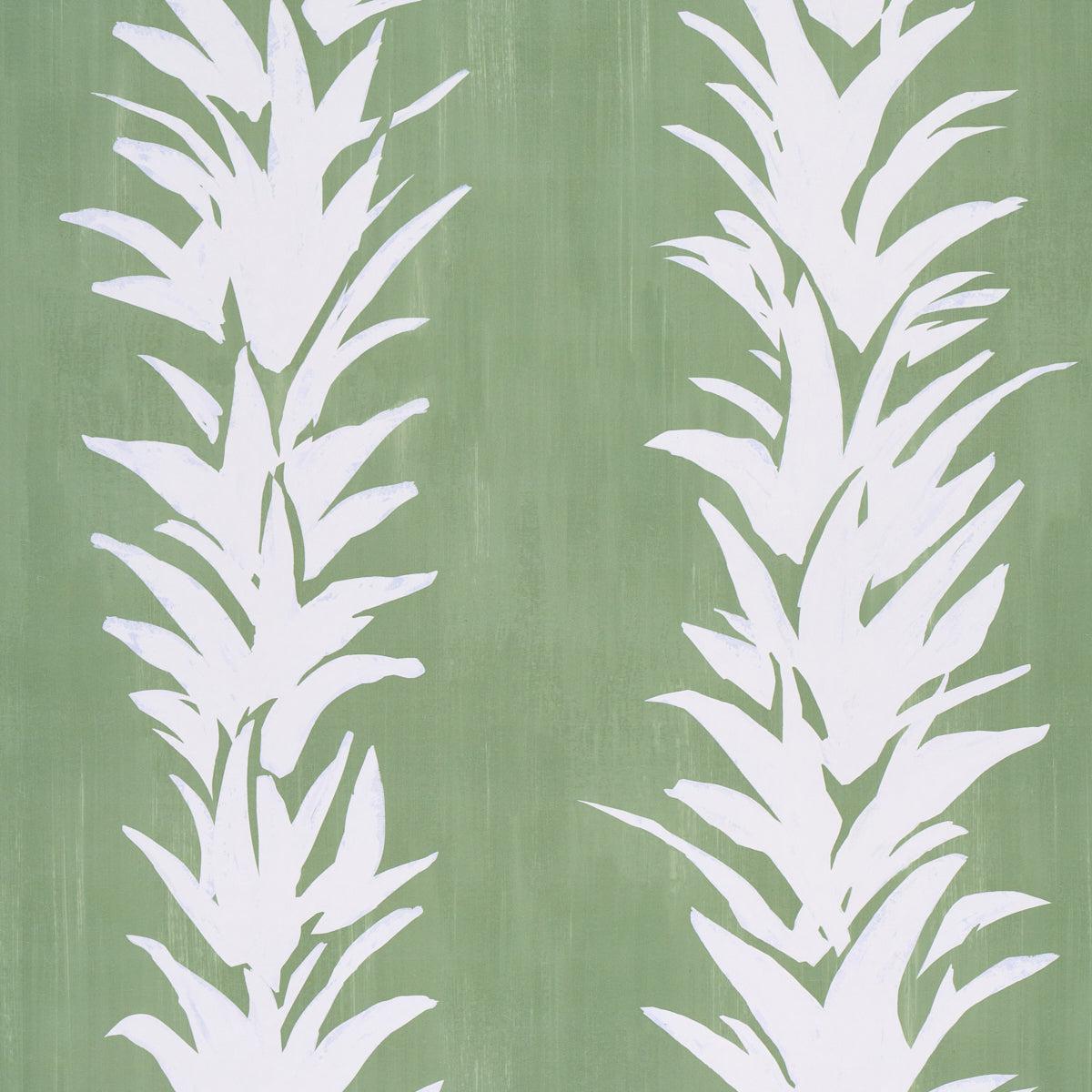 White Lotus wallpaper in soft green by Schumacher, featuring painterly abstracted lotus forms in white on a green background.