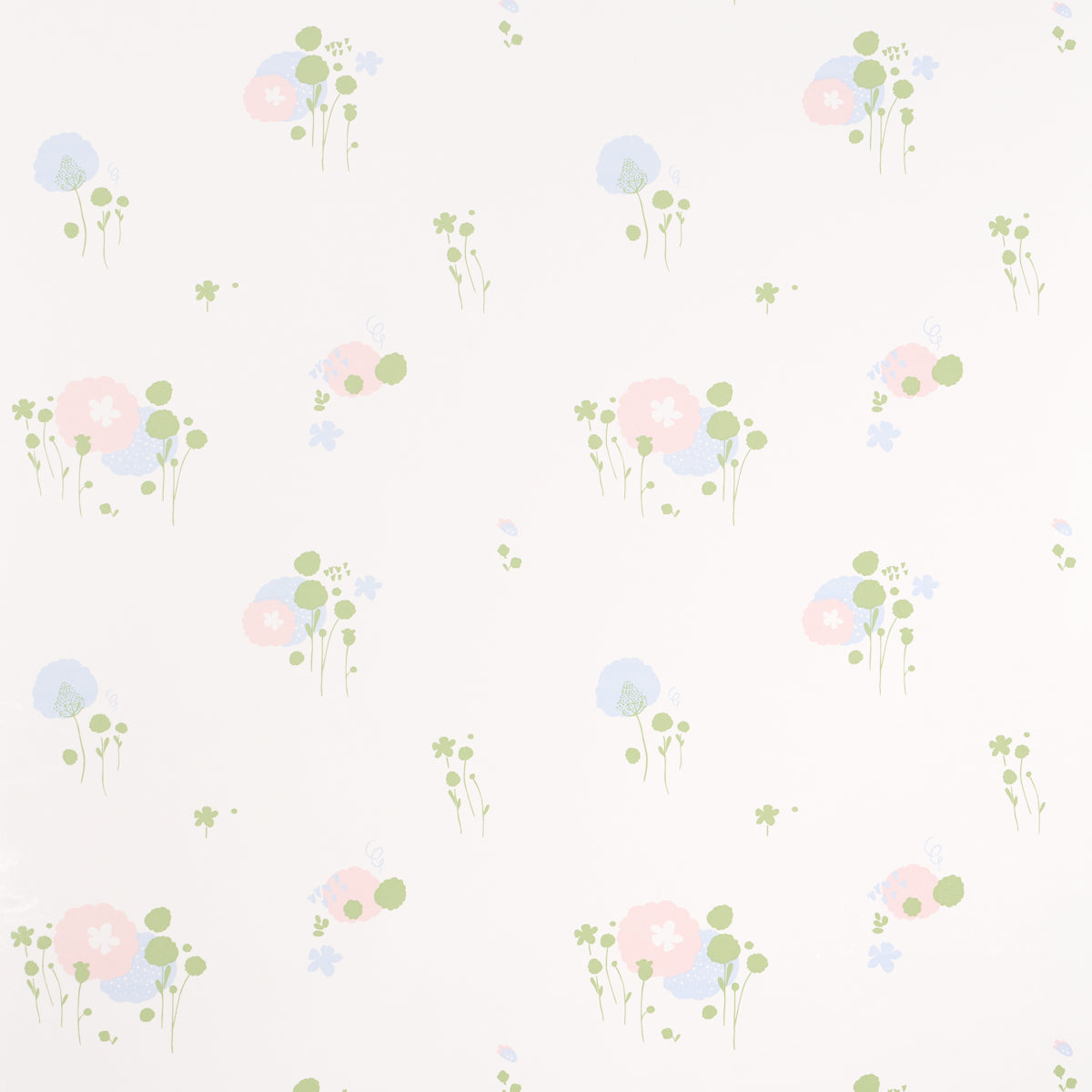 Pom Pom Forest wallpaper in ivory by Marie-Chantal for Schumacher, featuring a delicate small-scale floral pattern.