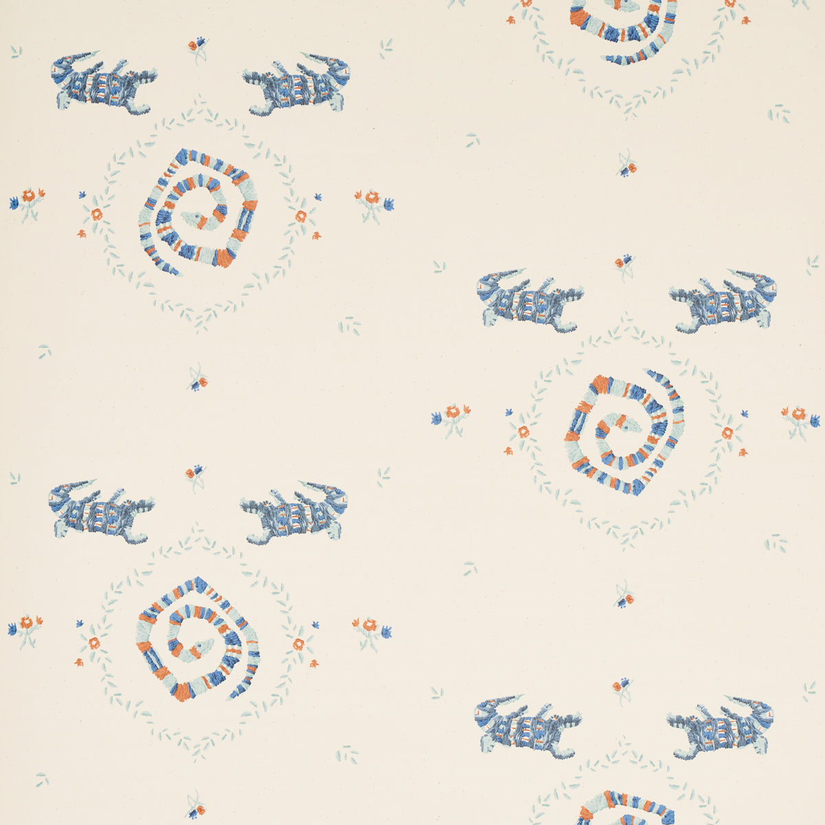 Reptilia wallpaper in warm blue by Schumacher, featuring playful embroidered alligators, snakes, and stylized swamp plants on a cream background.