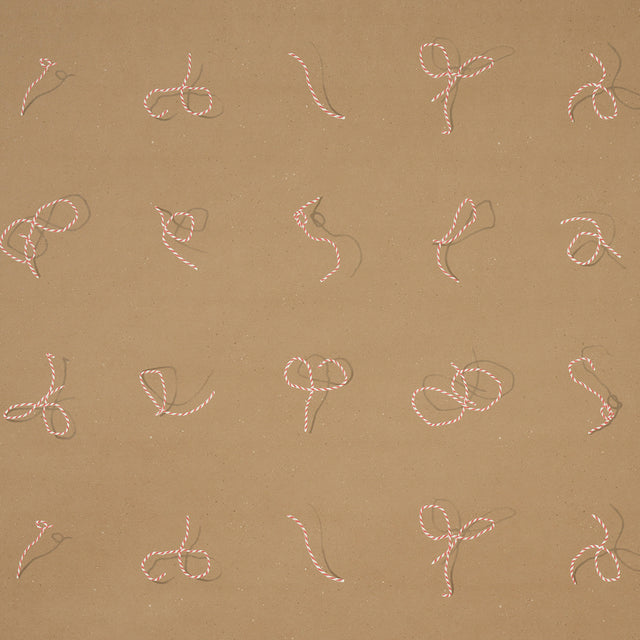 Butcher String wallpaper by Charlap Hyman & Herrero for Schumacher, featuring red and white twine on a brown background.