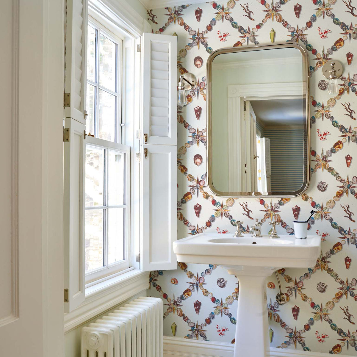 Grotto Treillage Multi on Ivory by Schumacher Playful Shell Trellis Designer Wallpaper – Schumacher 5014492