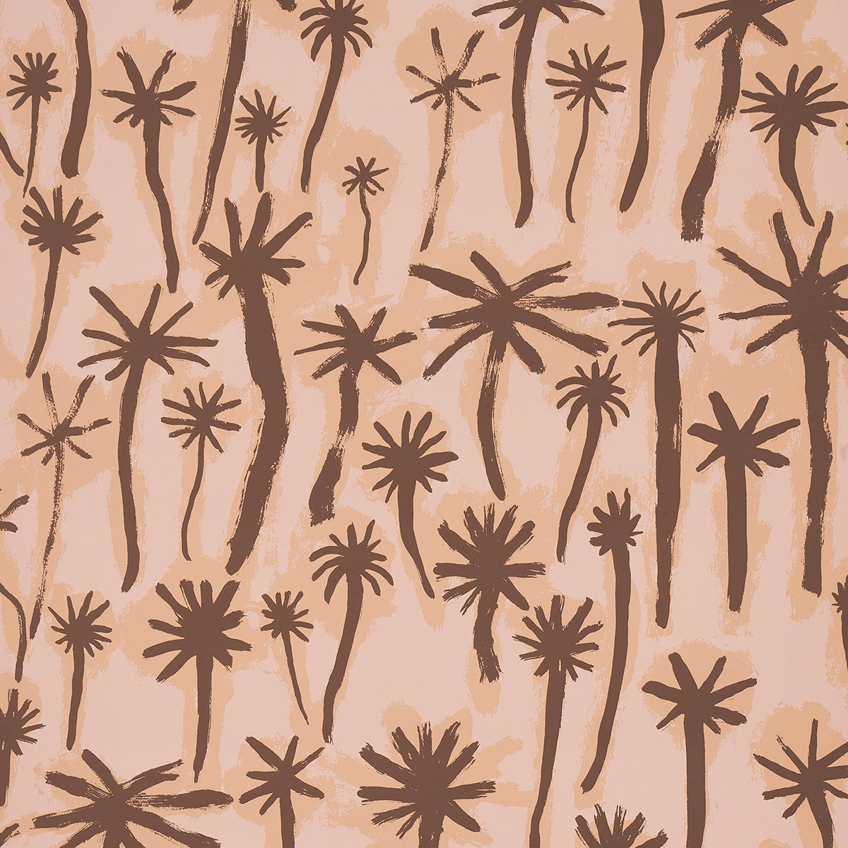 PALMITAS wallpaper in coral by Abel Macias for Schumacher, featuring hand-painted palm tree motifs in a painterly, tropical style.