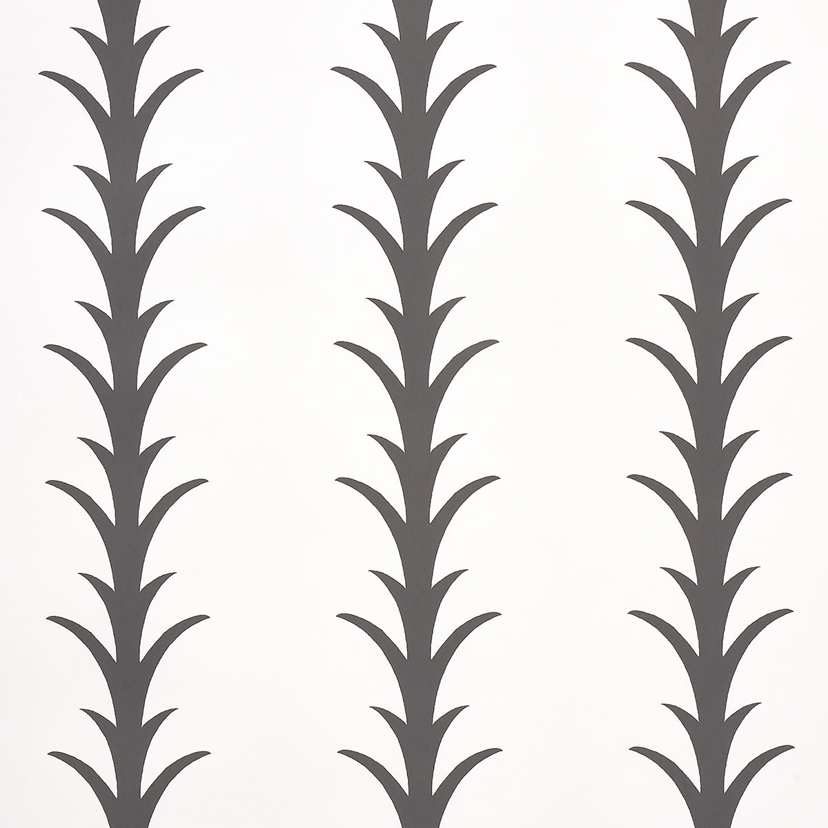 Acanthus Stripe wallpaper in carbon on ivory by Schumacher, featuring a stylized acanthus leaf stripe pattern in a modern interior setting.