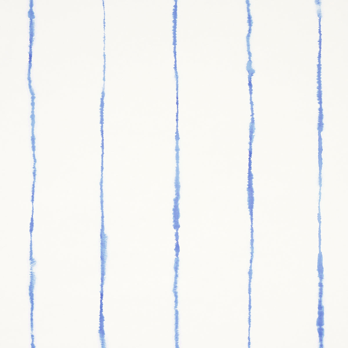 Ephemera Cornflower by Backdrop for Schumacher - watercolor vertical stripe wallpaper in blue and white, shown in a bathroom interior and close-up views.