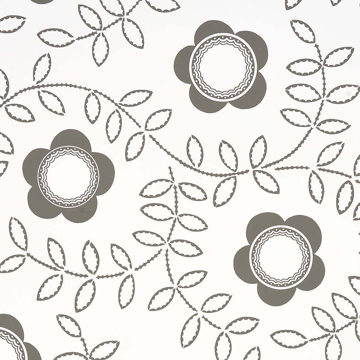 TUDOR ROSE wallpaper in charcoal and white by Schumacher, featuring a bold floral and leaf pattern designed by Neisha Crosland.