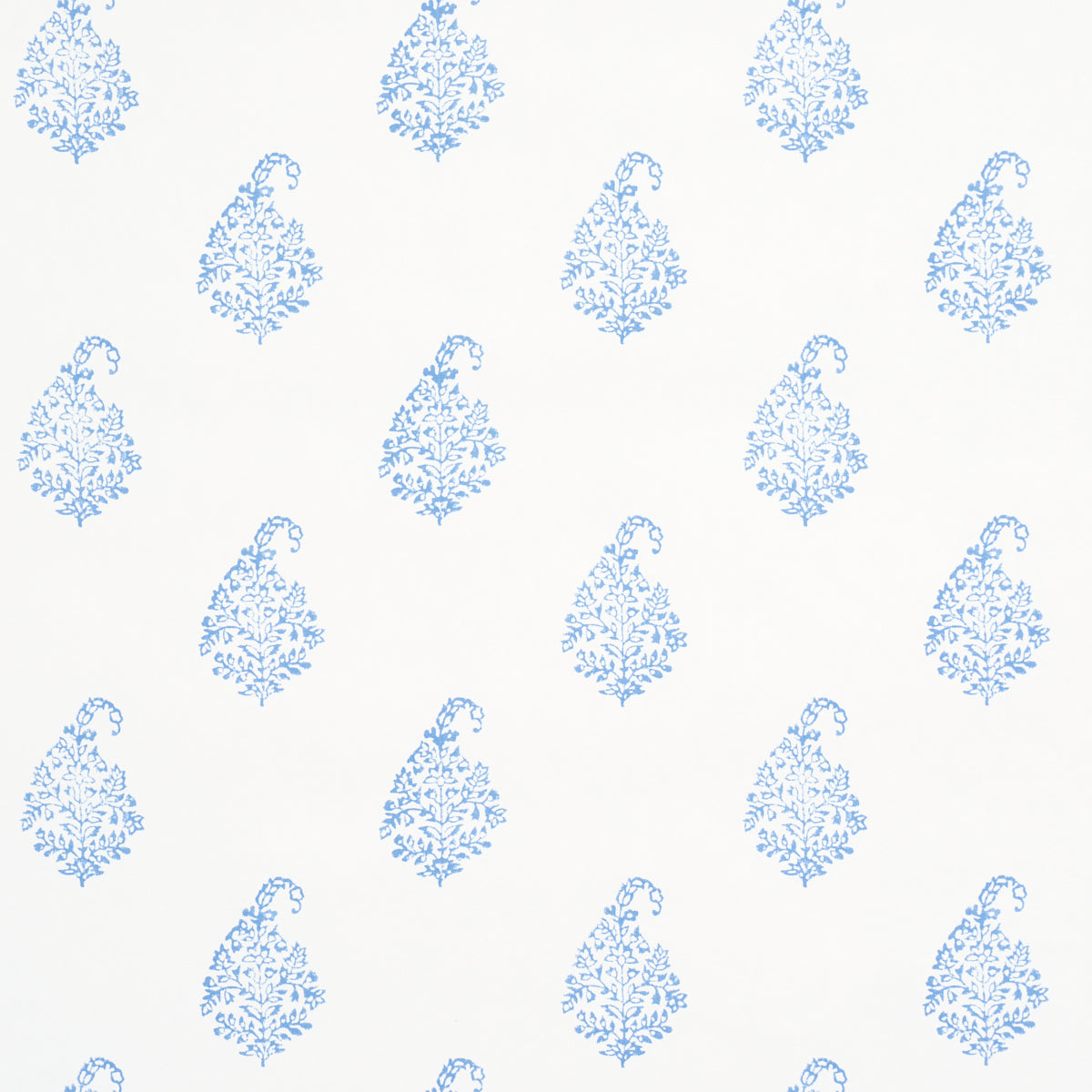 Kerala Paisley II blue paisley wallpaper by Schumacher shown in a bathroom and bedroom interior, classic handblock print style.