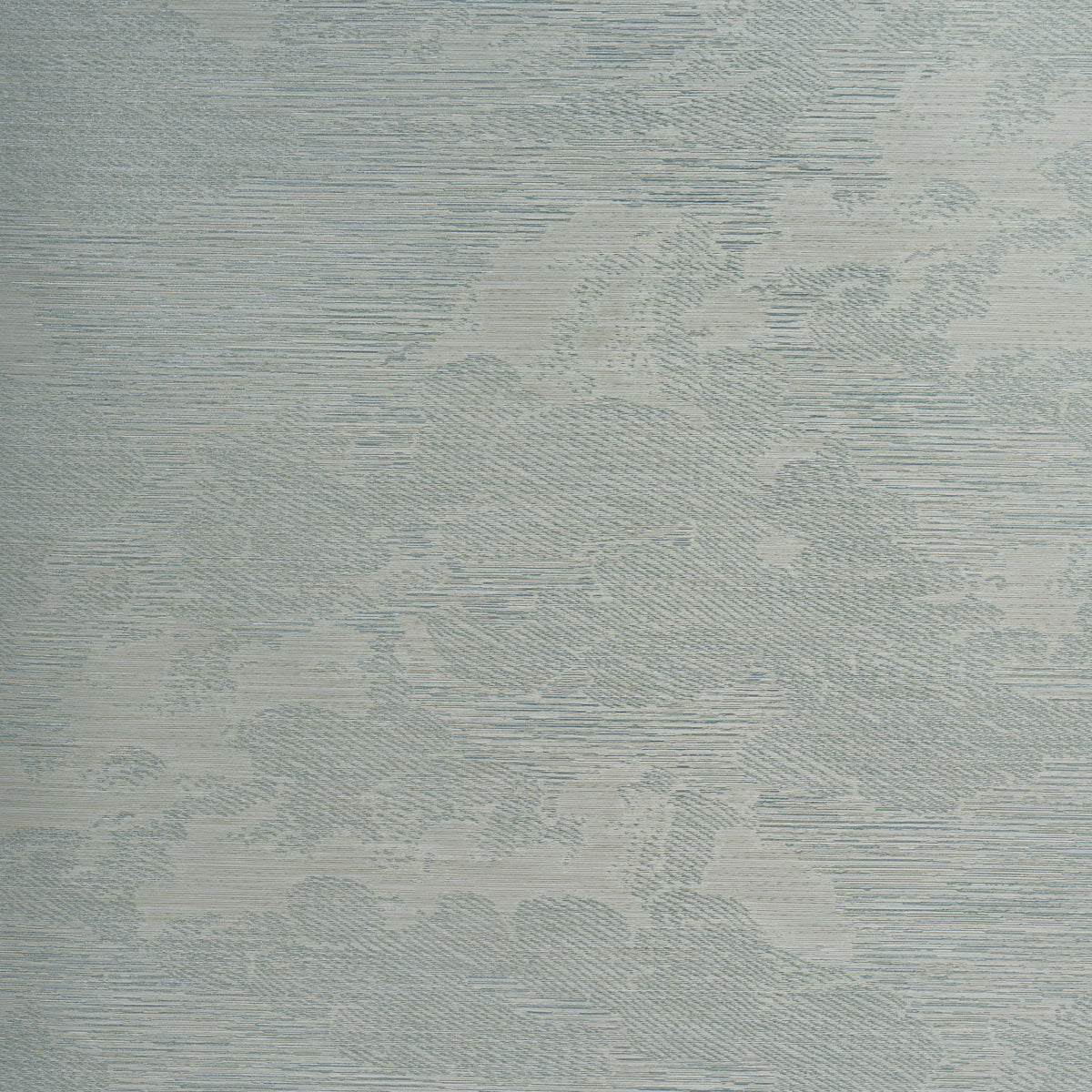 Drifting Cloudscape Mist wallpaper by Schumacher, a large-scale woven wallcovering with a subtle cloud-inspired pattern and metallic shimmer, shown in a serene bedroom setting.