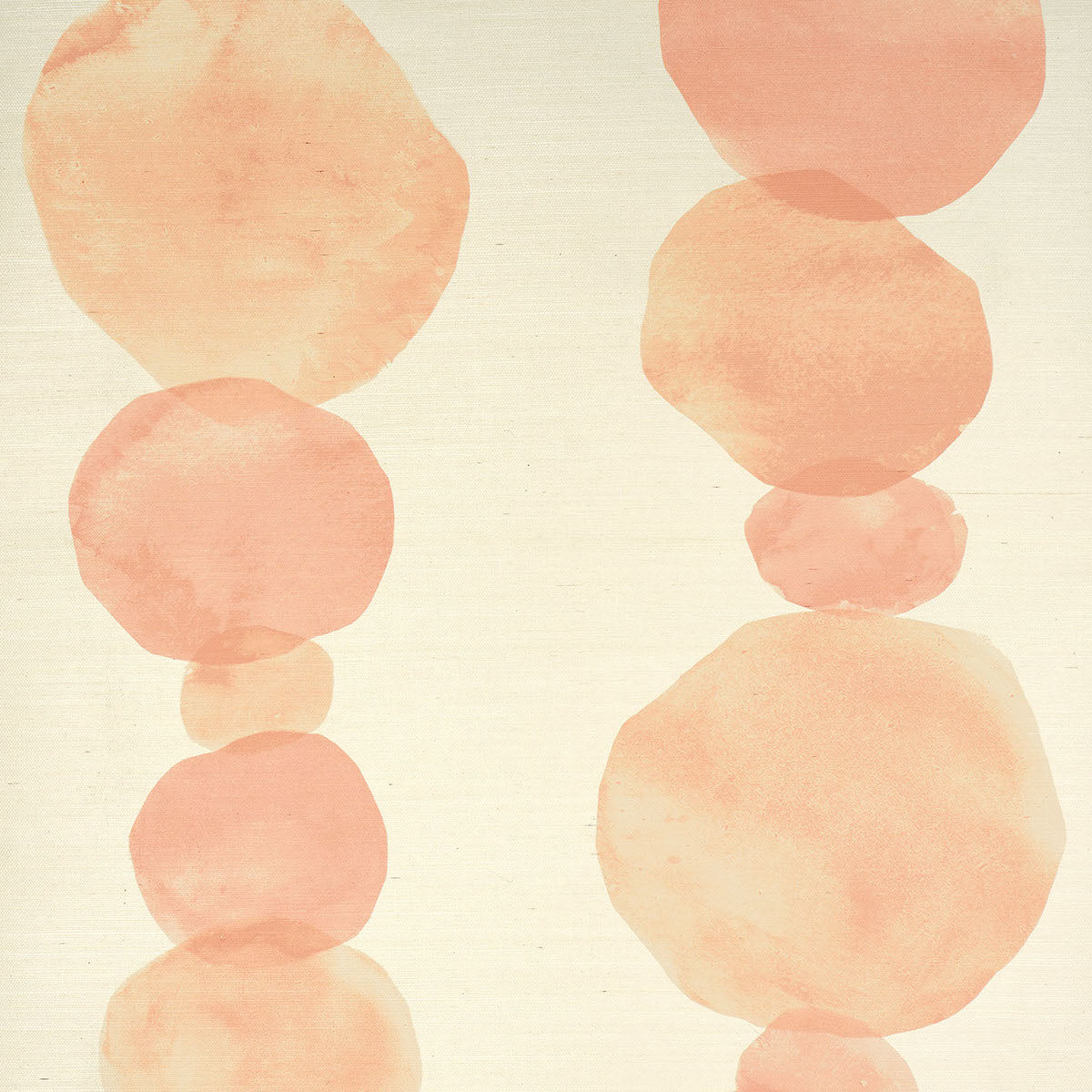 Hyperion Sisal wallpaper in peach by Schumacher, featuring large-scale circular forms in a hand-painted ink wash style on natural sisal texture.