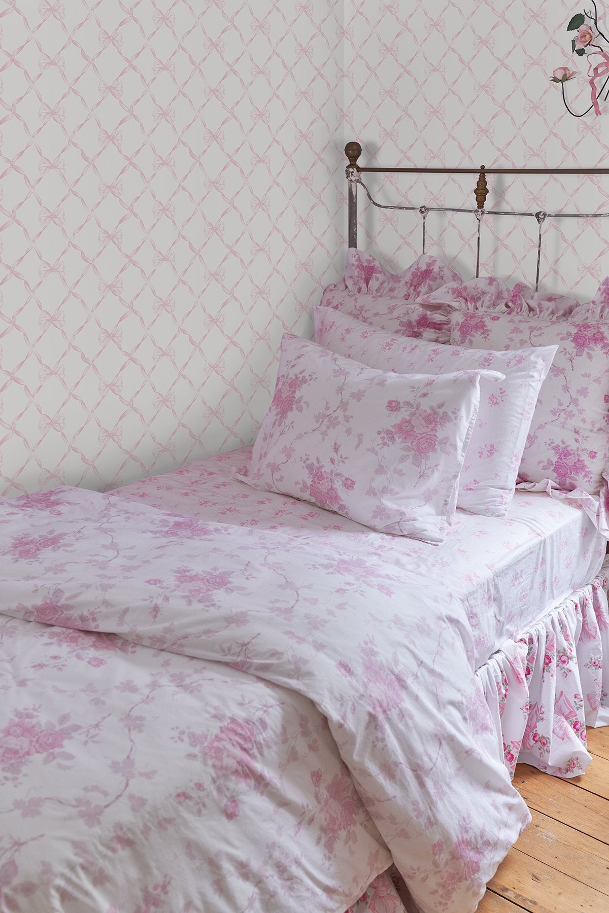 Baby Bow Pink Jam Peel & Stick Wallpaper with Whimsical Novelty Bow Trellis - NuWallpaper LFS5012