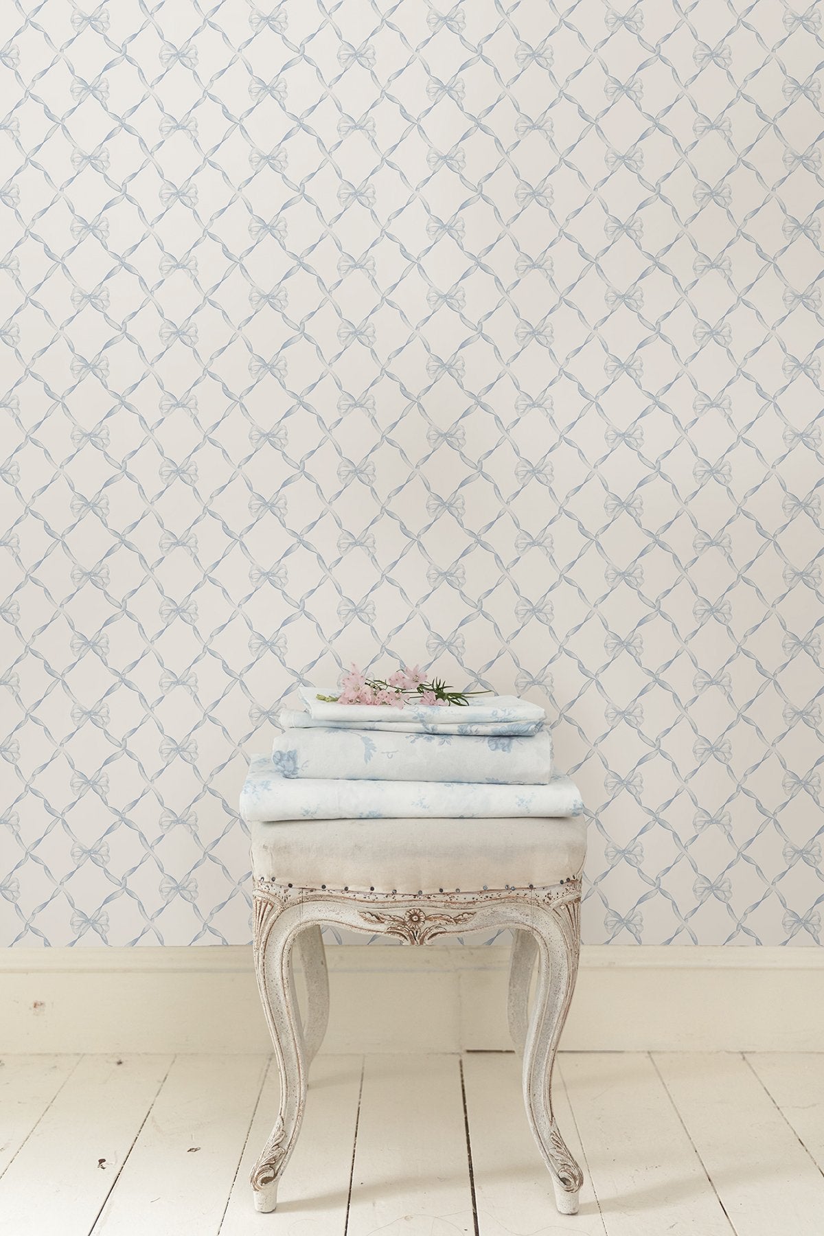Baby Bow Dreamy Sky Peel & Stick Wallpaper with Whimsical Blue Ribbon Trellis - NuWallpaper LFS5013