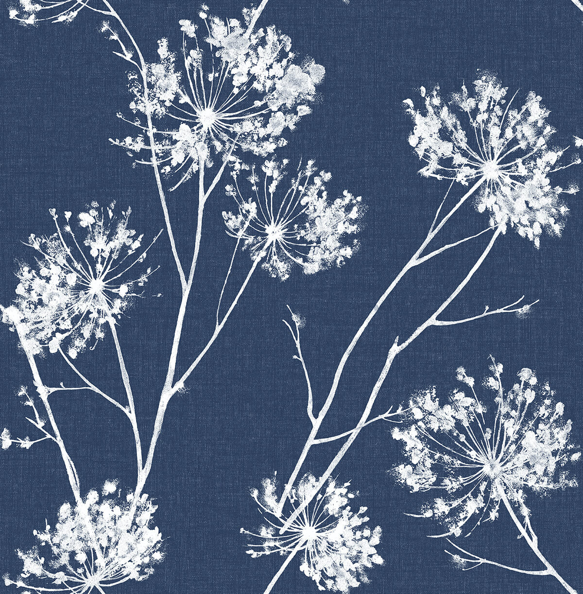 Denim blue peel and stick wallpaper with white botanical floral silhouettes in a half-drop layout.