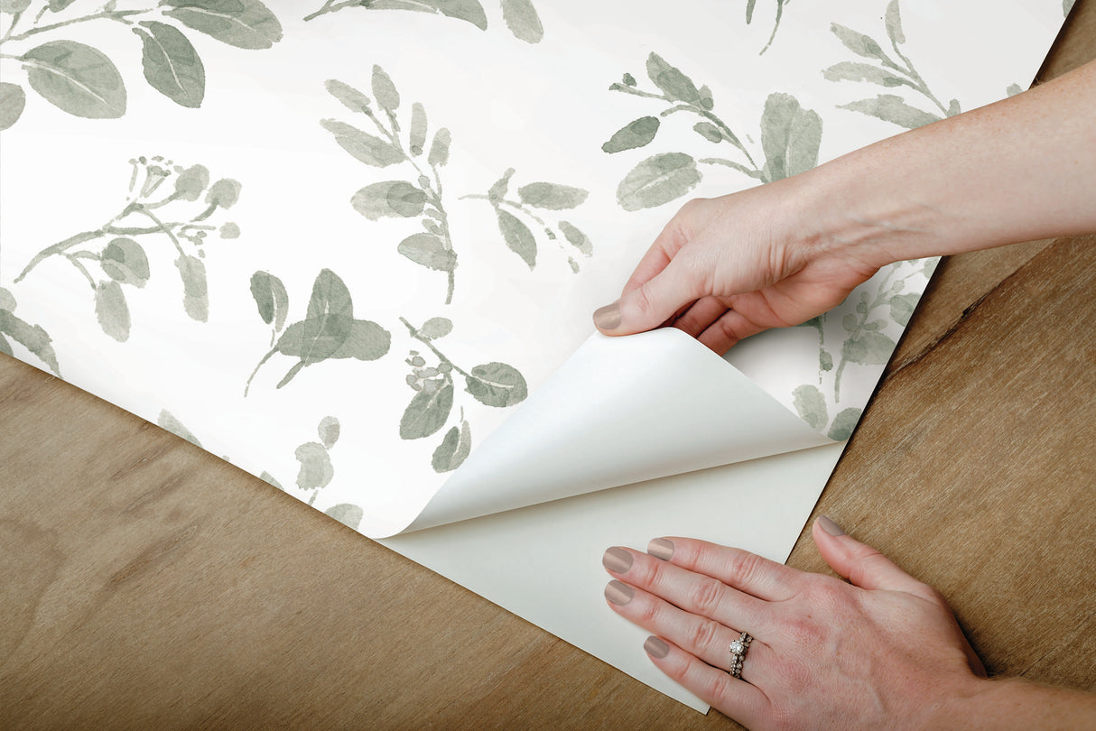 Dancing Leaves Green Peel & Stick Wallpaper with Whimsical Botanical Floral Pattern - York RMK12274PL