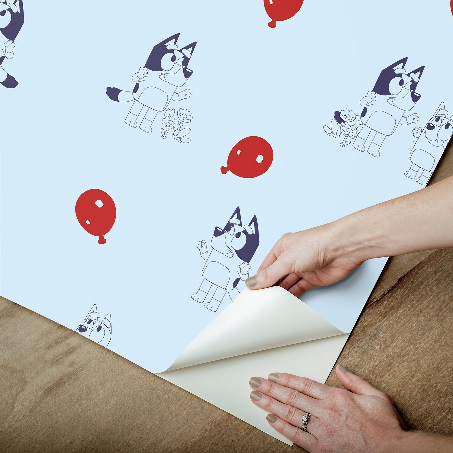 Bluey Keepy Uppy Blue Peel & Stick Wallpaper with Novelty Graphics - York RMK12800PLW