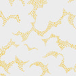Molntuss yellow polka-dot cloud wallpaper by Boråstapeter for Schumacher, styled in a modern entryway