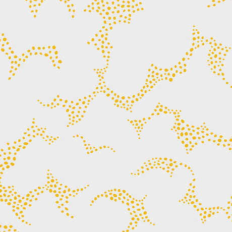 Molntuss yellow polka-dot cloud wallpaper by Boråstapeter for Schumacher, styled in a modern entryway