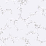 Molntuss grey wallpaper by Boråstapeter for Schumacher, featuring playful cloud and polka-dot design in a modern bedroom setting.