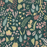 Herbarium wallpaper in Spruce by Boråstapeter for Schumacher, featuring whimsical Scandinavian floral and leaf motifs in green, pink, and yellow.