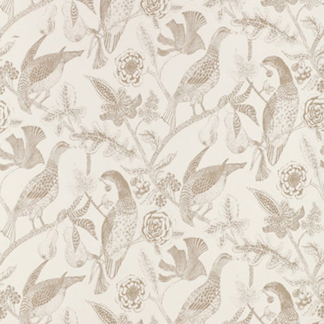 Beige hand screen printed wallpaper with a botanical and bird motif from Schumacher's Katmandu collection, styled in a classic interior setting.