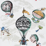 Colorful hot air balloons and clouds on a whimsical wallpaper design by Schumacher.