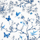 Porcelain blue and white wallpaper featuring birds and butterflies among delicate branches and foliage, Schumacher Birds & Butterflies.
