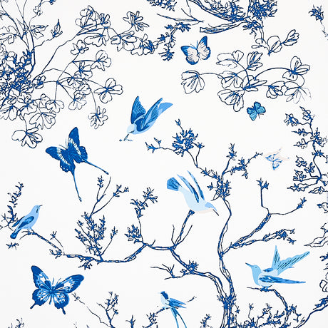 Porcelain blue and white wallpaper featuring birds and butterflies among delicate branches and foliage, Schumacher Birds & Butterflies.