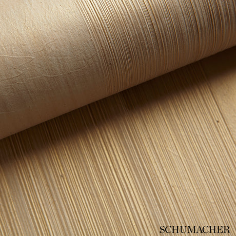 Close-up of Schumacher Casual Brush ivory handcrafted textured wallcovering with horizontal brushstroke pattern.