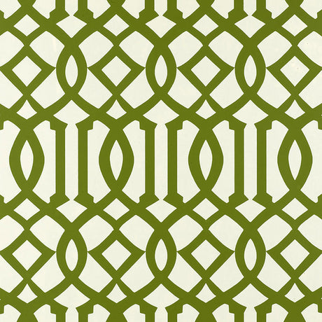 Imperial Trellis wallpaper in Treillage green by Kelly Wearstler for Schumacher, featuring a bold geometric trellis pattern on walls in a bright interior.
