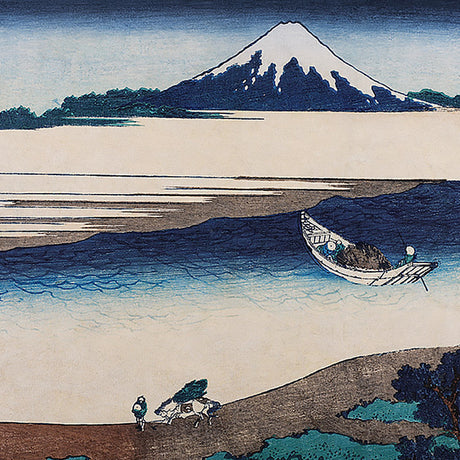 Hokusai Mural by Boråstapeter for Schumacher, blue Japanese landscape wall mural inspired by Mount Fuji, shown in a modern living room interior.