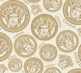 Versace Monarch wallpaper with gold foiled Medusa medallions on a cream background