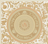 Versace Ember Marigold medallion wallpaper with ornate gold florals and Greek key border on a light ground.