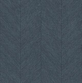 Kallam Indigo Chevron Wallpaper roll showing textured chevron pattern in deep blue.