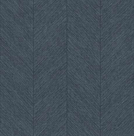 Kallam Indigo Chevron Wallpaper roll showing textured chevron pattern in deep blue.