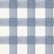 Thorpe Blue Plaid Wallpaper by Chesapeake featuring a large-scale buffalo check pattern in shades of blue and white with a textured flannel-inspired finish