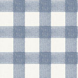 Thorpe Blue Plaid Wallpaper by Chesapeake featuring a large-scale buffalo check pattern in shades of blue and white with a textured flannel-inspired finish