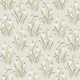 Boråstapeter Snödroppe Leaf wallpaper with stylized botanical snowdrop flowers in green and white on a neutral background, shown in a styled interior and pattern close-up.