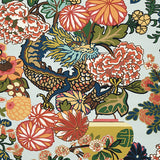 CHIANG MAI DRAGON Aquamarine wallpaper by Schumacher featuring a vibrant chinoiserie dragon and floral motif in a colorful Art Deco-inspired design.