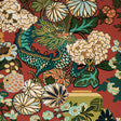 CHIANG MAI DRAGON wallpaper in Lacquer by Schumacher features a vibrant chinoiserie dragon and floral motif on a red background.