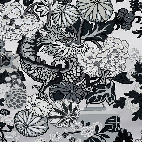 Chiang Mai Dragon Smoke wallpaper by Schumacher featuring a bold chinoiserie dragon and floral motif in black, white, and grey tones.