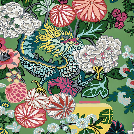 CHIANG MAI DRAGON Jade wallpaper by Schumacher features a vibrant chinoiserie dragon and floral motif in green, pink, yellow, and blue tones.