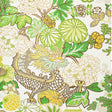 Chiang Mai Dragon Leaf wallpaper by Schumacher featuring a vibrant chinoiserie dragon and floral motif in green, yellow, and cream tones.