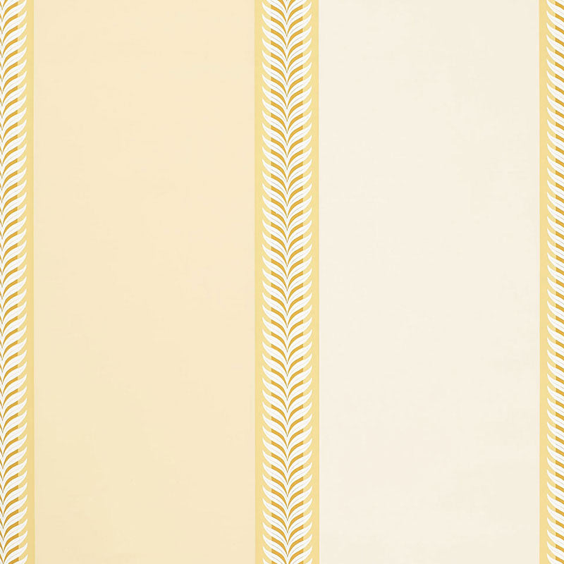 Valais Stripe wallpaper in soft yellow with alternating wide stripes and laurel leaf borders by Schumacher.