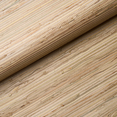Close-up of Schumacher Nami Rushcloth natural textured wallcovering in cork colorway, showing open weave and organic fibers.