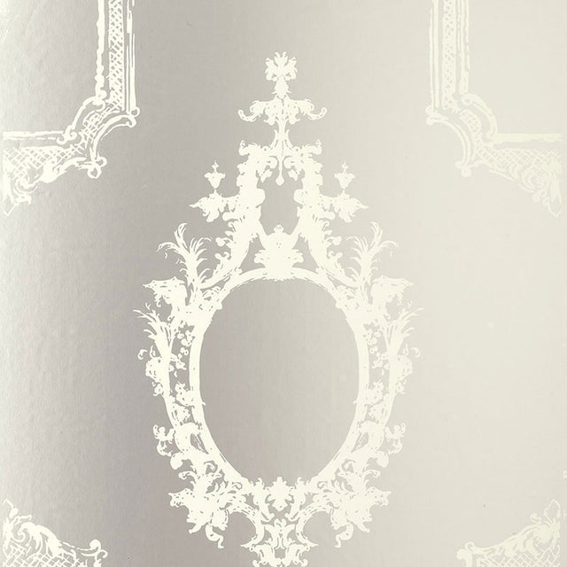 Go Baroque Mirror wallpaper with ornate baroque frame motifs in a reflective silver and white colorway by Schumacher.