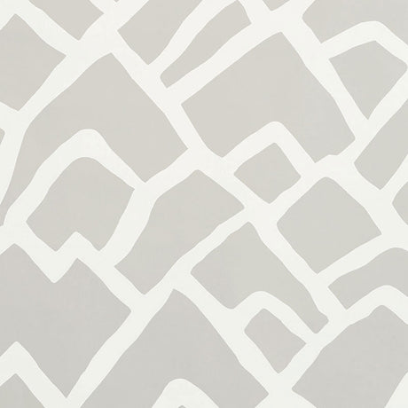 Zimba Fog by Schumacher - abstract hand-printed geometric wallpaper in soft grey and white, shown in a modern living room interior.