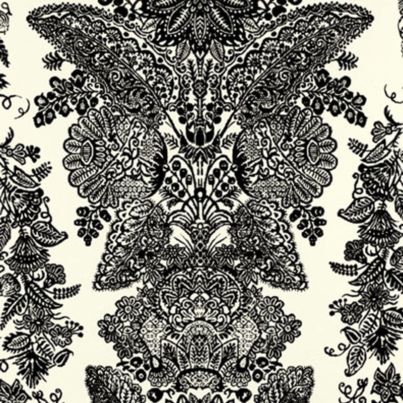 Lace wallpaper in black and ivory with intricate hand screen printed damask pattern by Schumacher