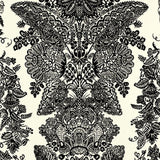 Lace wallpaper in black and ivory with intricate hand screen printed damask pattern by Schumacher