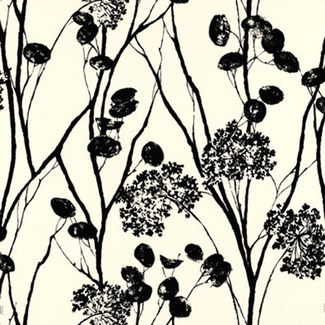 Moonpennies wallpaper in black and ivory by Schumacher, featuring a botanical silhouette pattern.