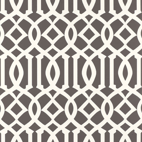 Imperial Trellis Charcoal by Kelly Wearstler for Schumacher - iconic geometric trellis wallpaper in charcoal and white, shown in bedroom and bathroom interiors.