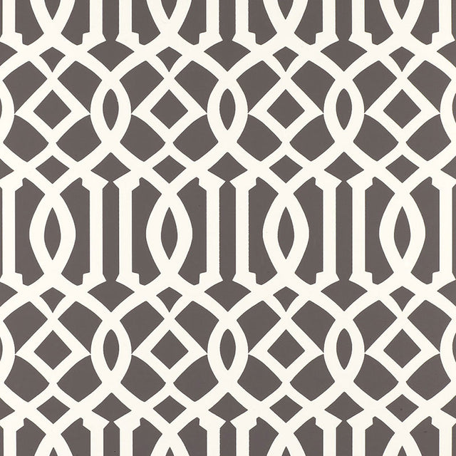 Imperial Trellis Charcoal by Kelly Wearstler for Schumacher - iconic geometric trellis wallpaper in charcoal and white, shown in bedroom and bathroom interiors.