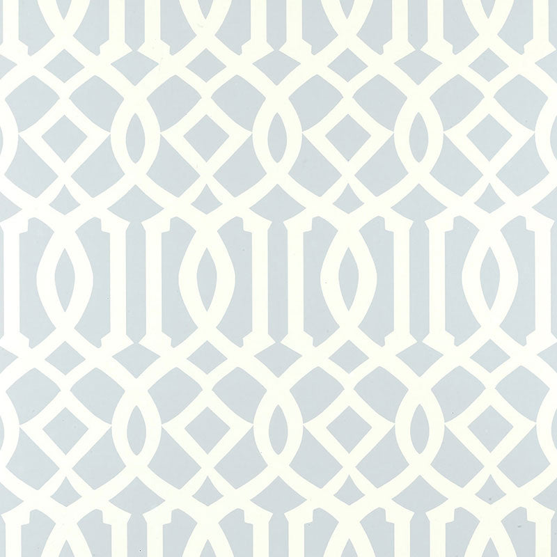 Imperial Trellis Soft Aqua by Kelly Wearstler for Schumacher - geometric trellis pattern wallpaper in a serene blue and white colorway, styled in a bedroom interior.